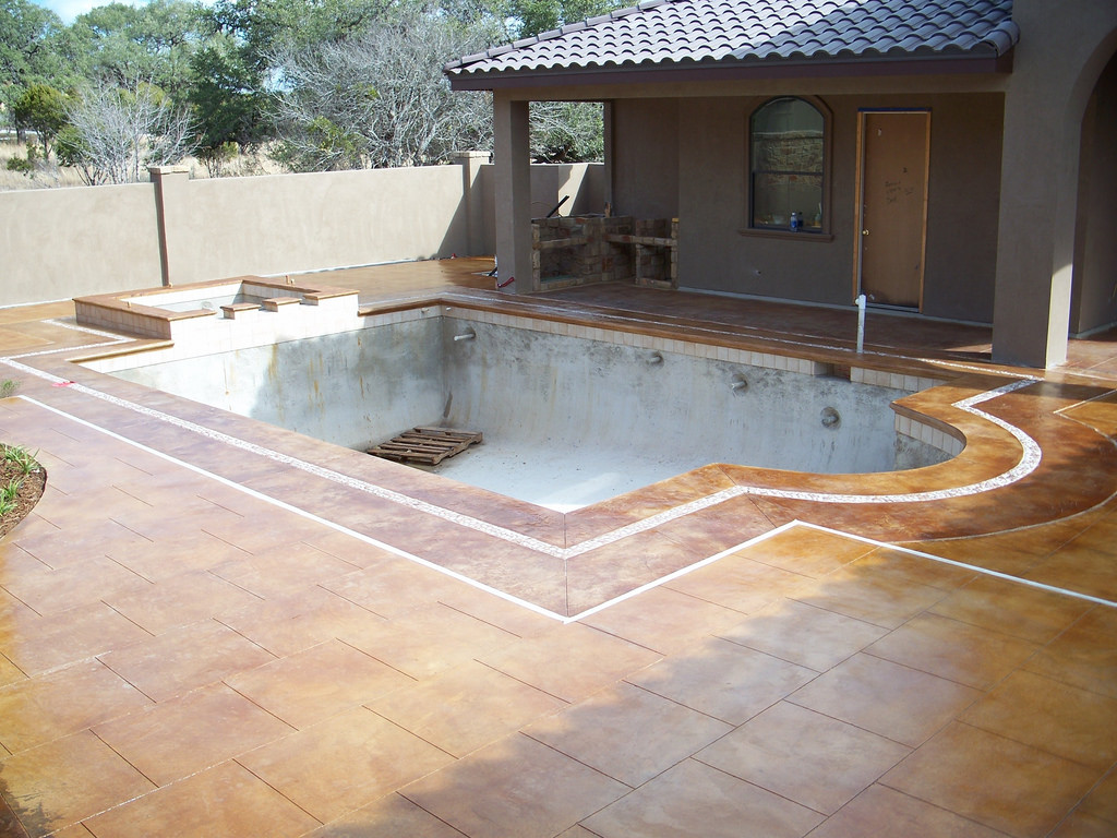 How Decorative Concrete Can Enhance Your Pool Deck and Add Value